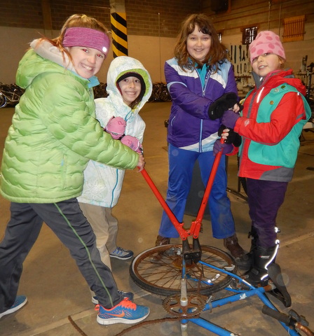 Girl scouts working in warehouse